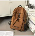 Brown large capacity nylon backpack with drawstring and buckled pocket on books - One Size / Brown