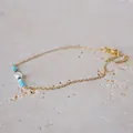 Detail of 18k gold plated chain with white pearl and blue beads on marble - Blue-Green Beaded Style with Single Artificial Pearl (Bracelet 21) / 17+3cm