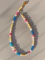 Macro view of multi-colored natural stone and baroque pearl beaded necklace with gold clasp - Multicolor Baroque Style (15)