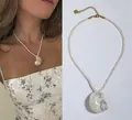 Minimalistische zoetwaterparelketting met een natuurlijke schelp hanger voor dames - Slanke Parelstijl / 38+5cm / Wit