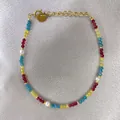 Detail of colorful faceted beads and white pearls bracelet with 18K gold plated clasp - Blue Yellow Red Beads with Pearl