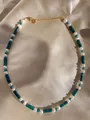 Detail of colorful gemstone beaded necklace with 18k gold lobster clasp on silk - Lake Blue Column Style (9)