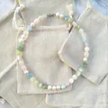 Handmade necklace with natural freshwater pearls and colorful gemstones on burlap bags - One Size / Light Blue Pink Artificial Pearl Style Necklace