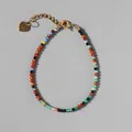 Close-up of colorful faceted stone beads bracelet with a gold heart charm and extender - Colorful