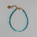 Detail of 2mm blue natural stone beads with 18k gold plated heart charm and clasp - Sky Blue