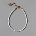 Detail of colorful natural stone beads with gold plated lobster clasp and heart charm - Pink Blue Gradient