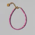 Detail of pink natural stone beaded bracelet with gold heart charm and 18k gold chain - Rose Red