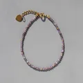 Détail de perles en cristal violet avec accents dorés et pendentif en forme de cœur - Violet Transparent (27)