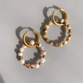 Detail of gold hoop earrings with natural stone beads and pearl charms for boho look - Spotted Texture Raw Stone Combination Style