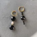 Detailed close-up of handmade asymmetrical beaded earrings with natural black stones - Black Faceted Cut Beaded Asymmetric Style