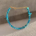 Detail of turquoise bead bracelet with gold extension chain and lobster clasp - Blue-Green Turquoise Chip Stone Style (1)
