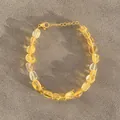 Dettaglio di perle di cristallo giallo con chiusura a moschettone dorata e catenella - Stile Perline Traslucide Irregolari Gialle (25SL1-39) / 17+3cm
