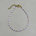 Detail of lavender and white glass beads with freshwater pearls and gold lobster clasp - Light Purple White Seed Bead Minimalist Style (15)