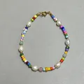 Detail view of colorful seed beads and natural freshwater pearls with golden lobster clasp - Multicolor Striped Baroque Freshwater Pearl Style (20)