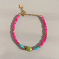 Detailed shot of handmade beaded bracelet with pink and blue stones and freshwater pearls - Pink Ethnic Pattern Style (13)
