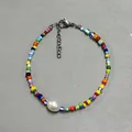 Detailed shot of handmade colorful beaded bracelet with a large white central pearl accent - Multicolor Seed Bead Center Round Pearl Style (25)