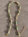 Close-up of handmade necklace with natural green stones and freshwater pearls with gold clasp - Light Green White Stone Natural Style (16)
