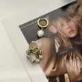 Baroque pearl and dalmatian jasper asymmetrical hoop earrings on a fashion magazine - Leopard Skin Jasper and Pearl Asymmetric Earrings (Pair) / One Size