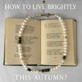 Elegant freshwater pearl necklace with turquoise beads on vintage book background - Vintage Pearl Necklace / 38+5cm / Dark Green Heishi Beads & Pearl