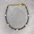 Detail of handmade freshwater pearl bracelet with colorful faceted beads and gold clasp - Deep Blue Cyan Polyhedron Small Pearl Style (31)