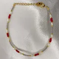 Detailed macro view of handmade beaded bracelet with freshwater pearls and colorful stones - Red Bead Labradorite Pearl Combined Style (32)