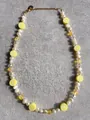 Detail of freshwater pearl necklace with lemon beads, lobster clasp and heart pendant - Lemon Slice Yellow Glass Style (28)