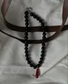 Retro beaded necklace with black round beads and red teardrop pendant on white canvas - One Size / Black Bead with Red Waterdrop Pendant Necklace