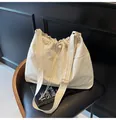 Beige pleated canvas tote bag with adjustable shoulder strap and drawstring closure - One Size / Off White