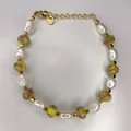 Detailed shot of handmade bracelet with baroque pearls, floral beads, and gold extender chain - Yellow Glass Pearl Pastoral Style (36)