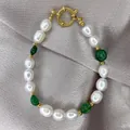 Macro shot of freshwater baroque pearl bracelet with green agate beads and golden OT clasp - Dark Green Ore OT Clasp Vintage Style (37)