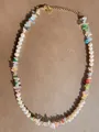 Detail of colorful gemstone beads with freshwater pearls and a gold heart pendant - Colorful Stone Heart Gold Chain Style (33)