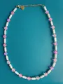 Close-up of handmade necklace with natural stones, freshwater pearls, and gold heart clasp - Pink Frosted White Cylinder Heart Piece Style (34)