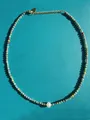 Detailed shot of colorful gemstone and pearl beaded necklace with gold heart charm clasp - Colorful Stone Texture Round Bead Heart Style (41)