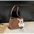 Brown PU leather bucket bag with cute plush bear charm and minimalist shoulder strap - With Pendant / Coffee