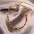 Bracciale di pietre naturali nei toni del rosso e arancione con chiusura dorata - Stile Perline Rotonde Agata Tono Rosso Arancio (25SL1-48) / 17+3cm