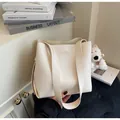 Minimalist creamy white large capacity tote bag with wide strap for daily commute - With Pendant / Off White