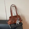 Brown pleated faux leather shoulder bag with metallic star and bear pendants - Brown