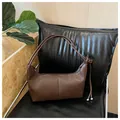 Minimalist dark brown leather tote bag with side ties and metallic bead detail - One Size / Coffee