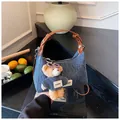Denim underarm bag with brown leather strap and a cute teddy bear plush charm - With Pendant / Denim Blue-Brown PU Strap