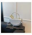 Silver metallic semi-circular crossbody bag with leather strap and gold ring detail - Silver / One Size