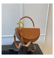 Caramel brown crescent box bag with gold ring lock and adjustable leather shoulder strap - Brown / One Size