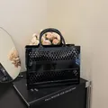 Large black hollow mesh jelly tote bag with diamond pattern for summer beach use - Black
