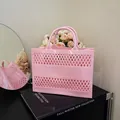 Pink hollow out jelly tote bag with flexible woven texture for summer beach trips - Pink