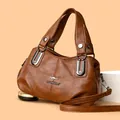 Deep brown leather crossbody bag for women with dual handles and silver hardware finish - One Size / Brown