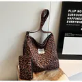 Large leopard print canvas tote bag with matching zipper pouch and white brand label - One Size / Brown