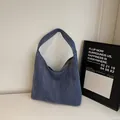 Large capacity washed blue denim hobo shoulder bag with a vintage minimalist aesthetic - Dark Blue