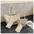 Detail showing high-quality beige tote bag set with cute cartoon pattern and metal logo - Large / Off White