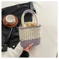 Handwoven purple and cream straw tote bag with dual handles and drawstring inner pouch - One Size / Purple