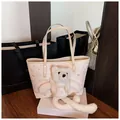Pink cartoon bear print tote bag with plush bear charm and spacious shoulder straps - Pink
