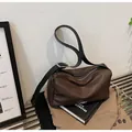 Retro large brown leather tote bag with wide strap and silver buckle in minimal style - One Size / Coffee